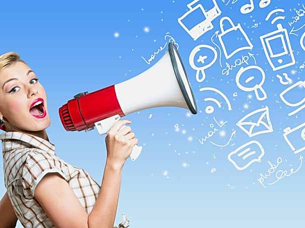 Retro style woman holding megaphone